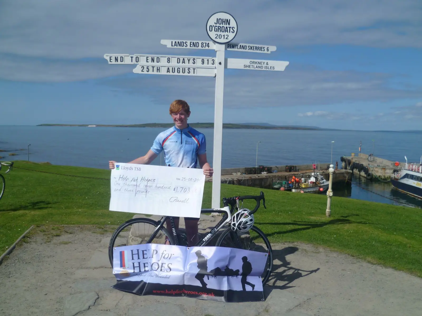 Chris Fennell at John O’Groats after completing his Help for Heroes charity ride