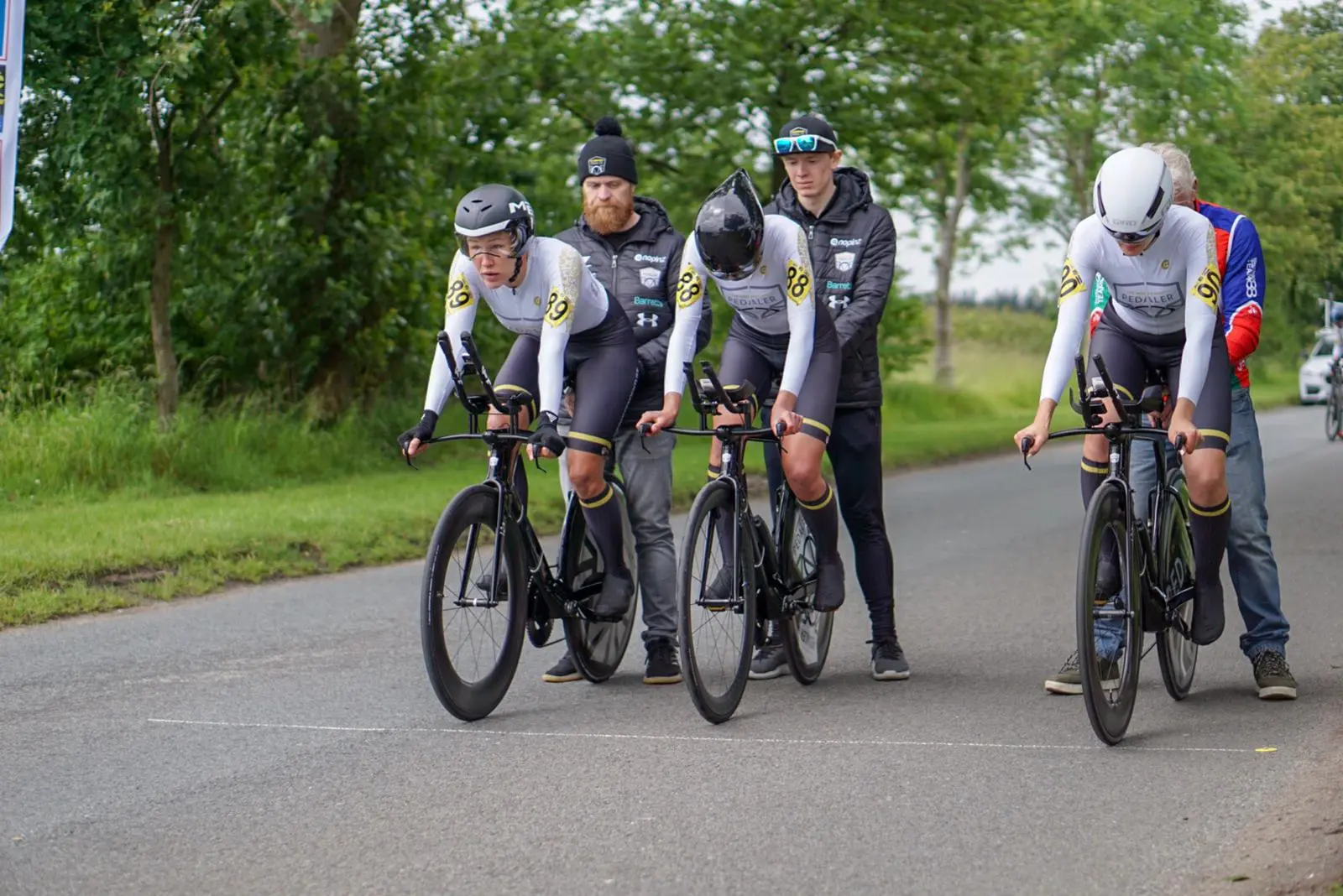 The Independent Pedaler women’s cycling team preparing to start a team time trial