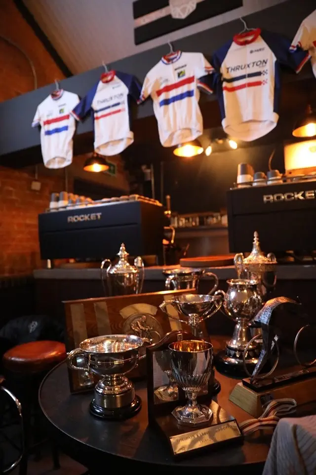 National cycling trophies displayed at Rocket Espresso